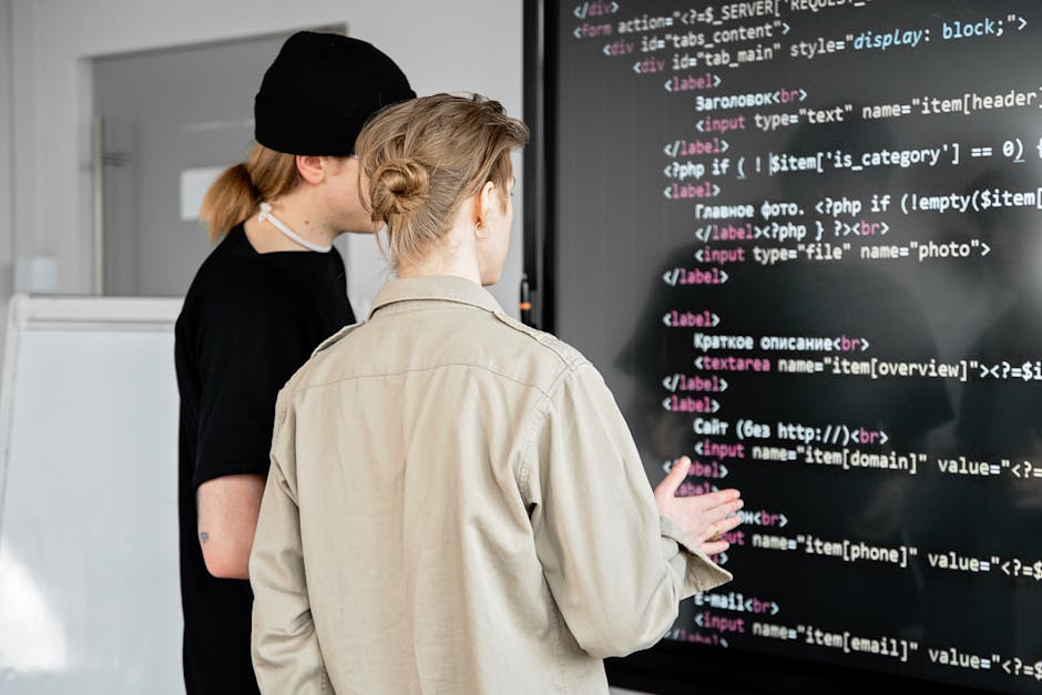 Student reviewing Python syntax on a laptop